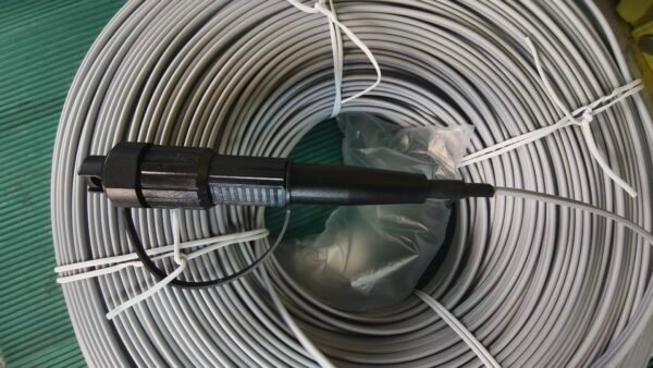 Feature connector serial number for quality assurance and close-up details. Hand holding black fiber optic connector with serial 14137749-007 and 250m marking.